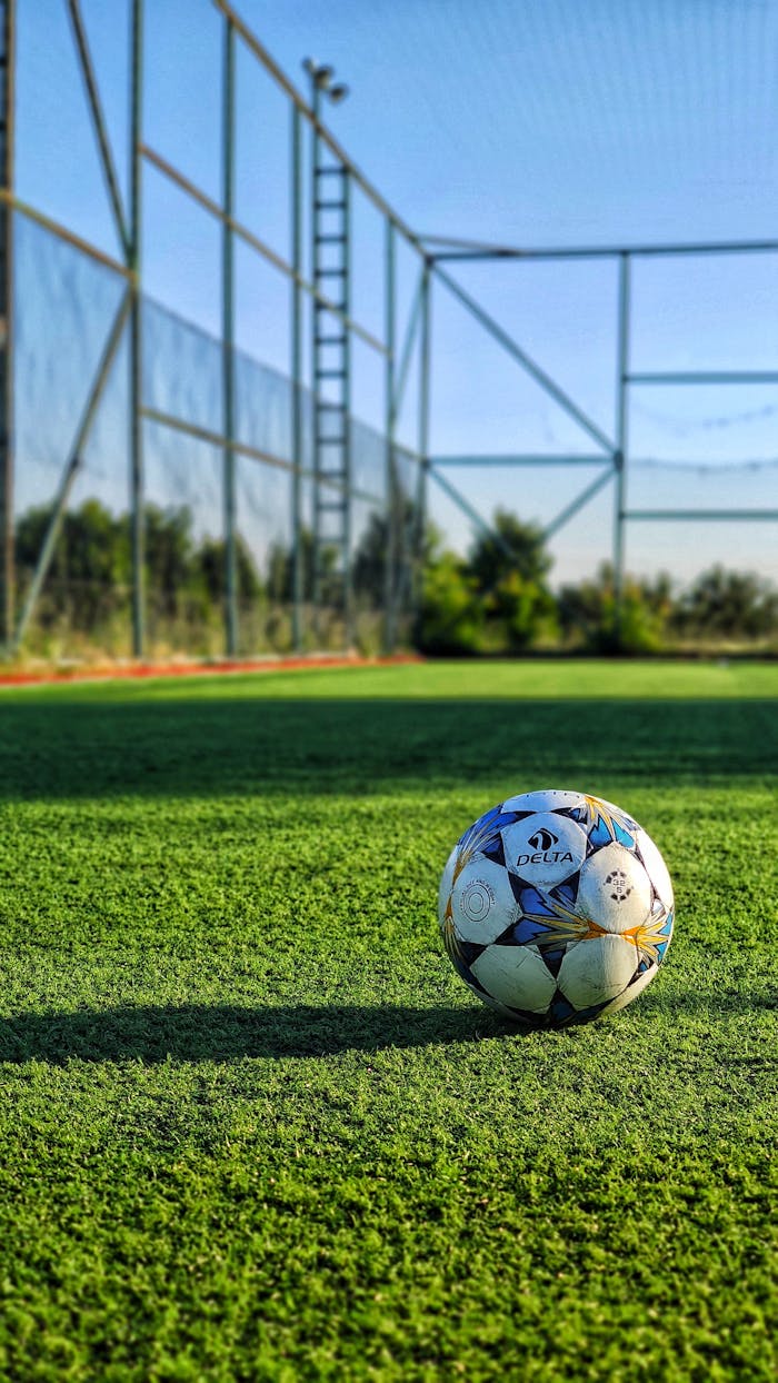 hero-img-01 Vibrant photo of a soccer ball on an outdoor field in Istanbul, Turkey.